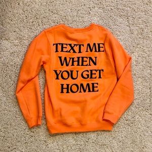 Bright orange lonely ghost crewneck
